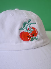 "You say Tomato, I say Tomate" hat design by Natali Koromoto.