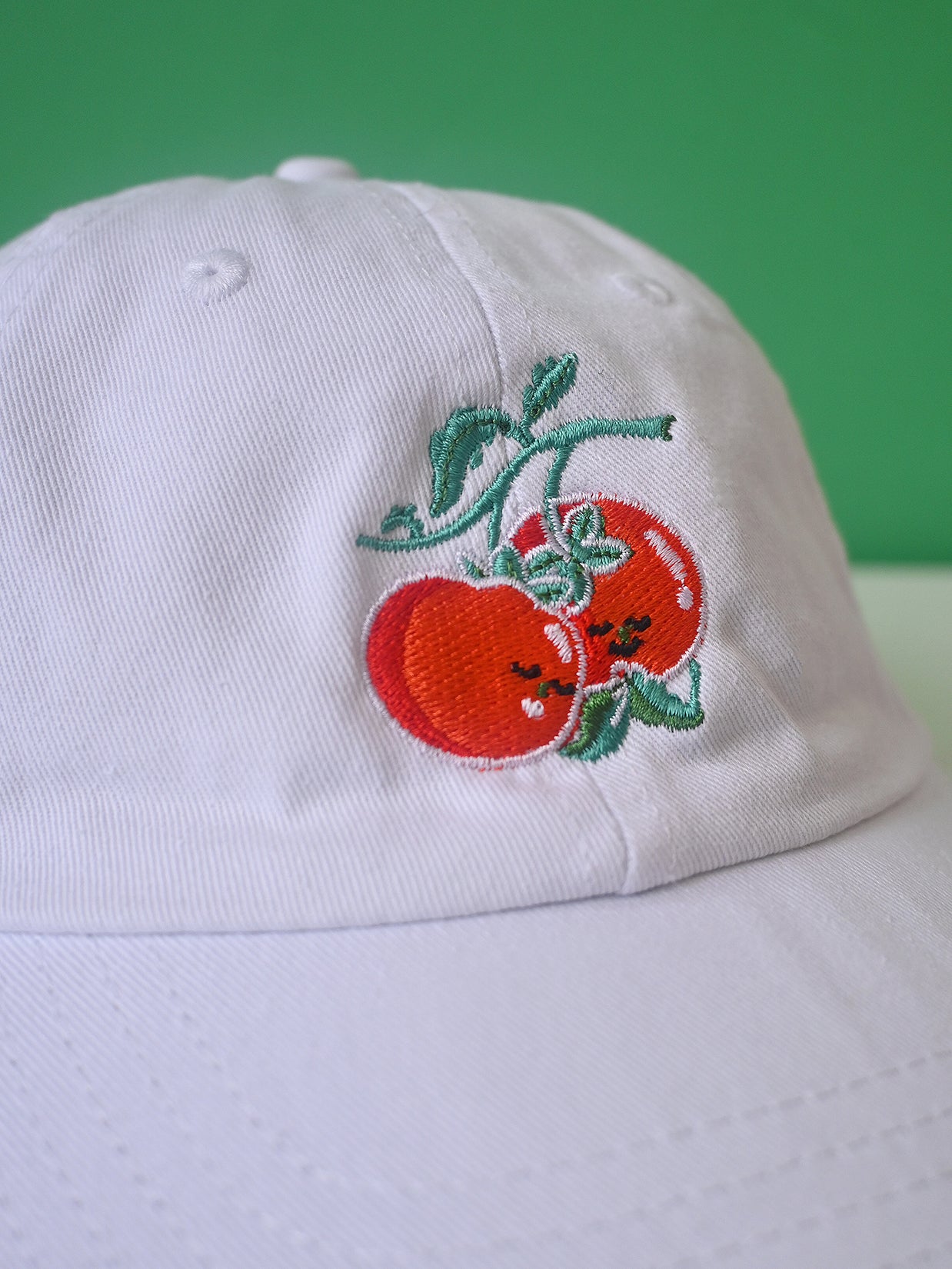 "You say Tomato, I say Tomate" hat design by Natali Koromoto.