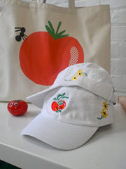 "You say Tomato, I say Tomate" hat design by Natali Koromoto.
