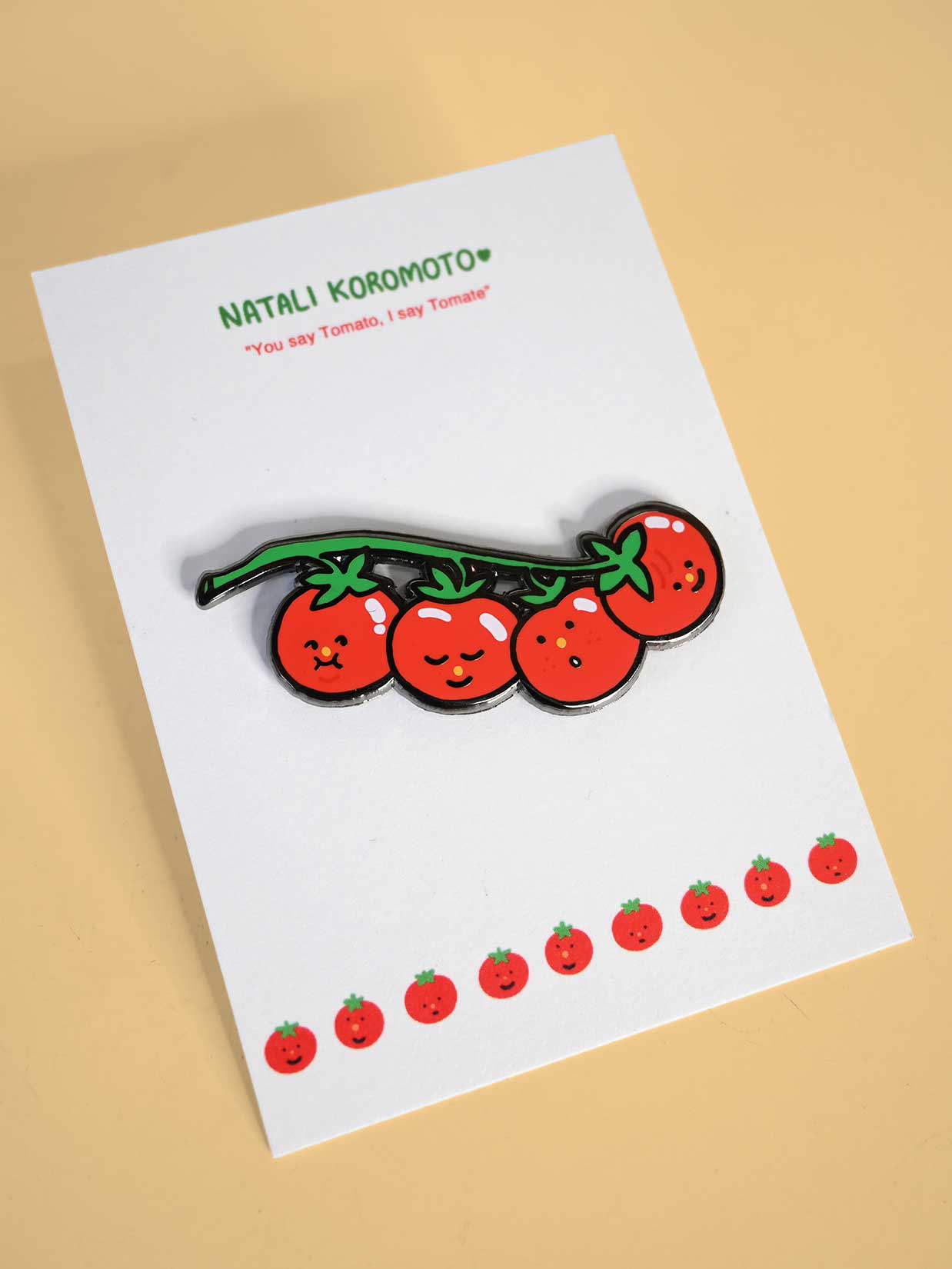 "You say tomato, I say tomate" Enamel Pin. Design by Natali Koromoto Martinez (NYC)