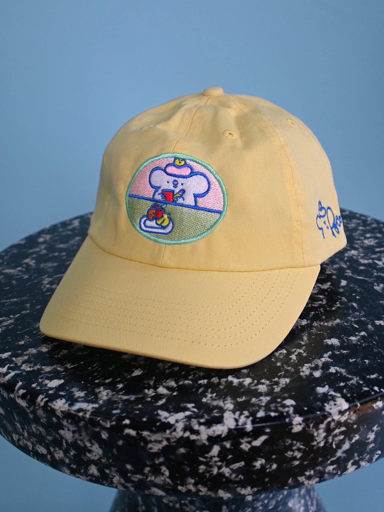 "Still Life with Poco" Cap design by Natali Koromoto.