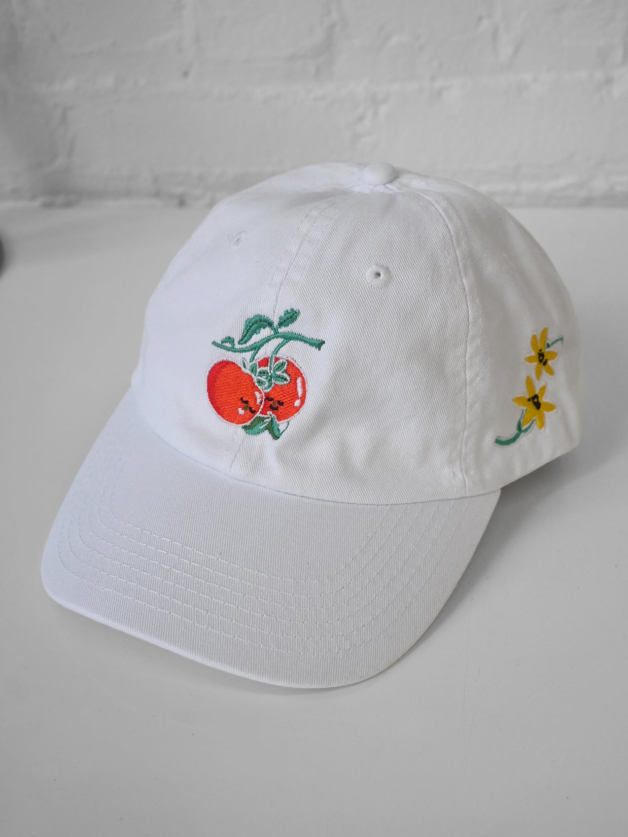 "You say Tomato, I say Tomate" hat design by Natali Koromoto.