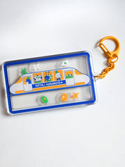 "Passengers" Keychain. Design by Natali Koromoto