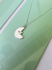 "Moonshine" Sterling silver pendant. Design by Natali Koromoto.