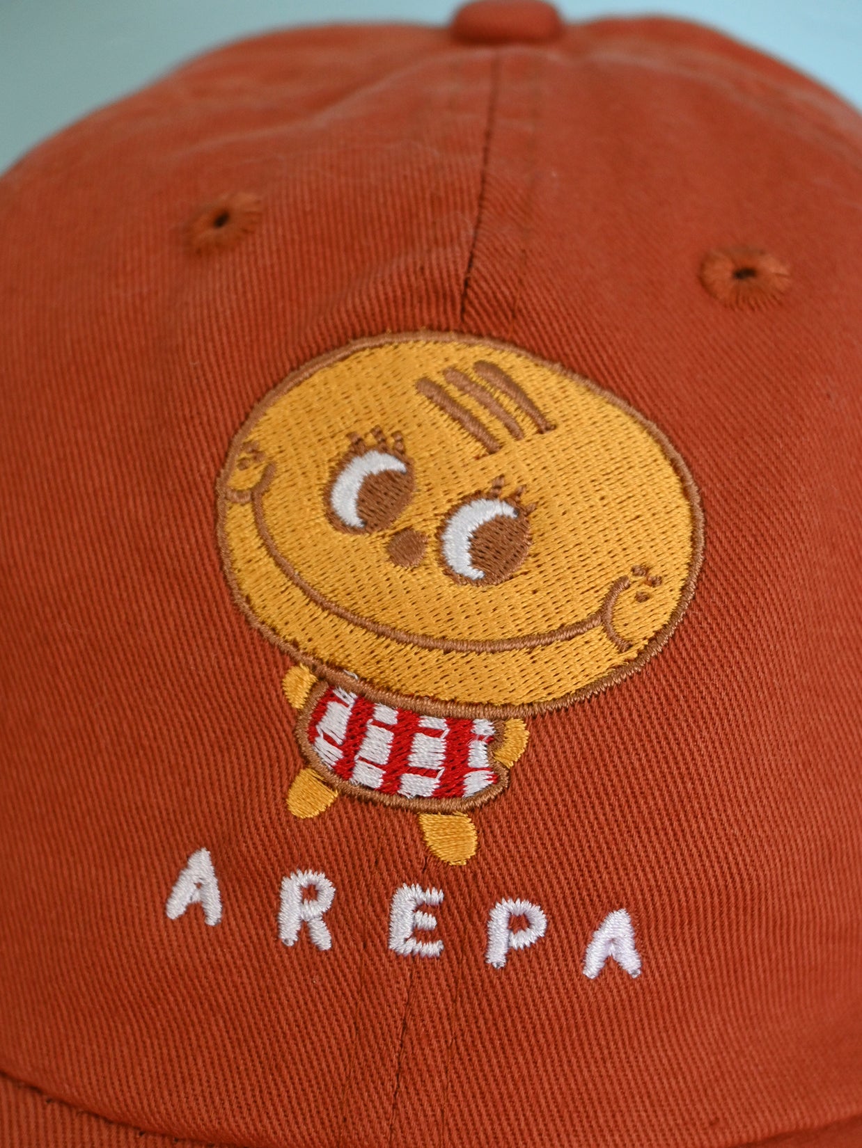 "Arepa" terra-cotta color embroidered cap