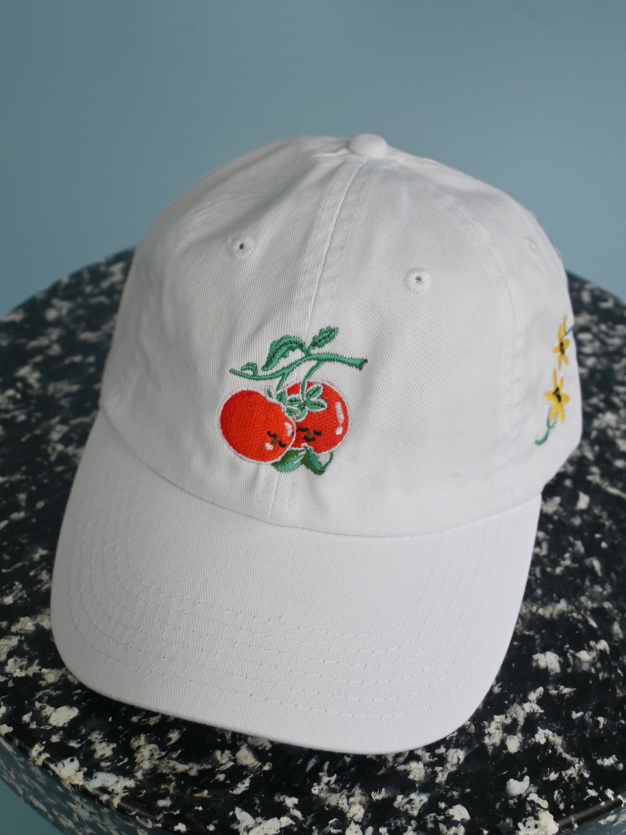 "You say Tomato, I say Tomate" hat design by Natali Koromoto.