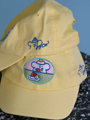 "Still Life with Poco" Cap design by Natali Koromoto.