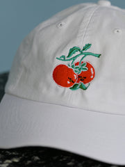 "You say Tomato, I say Tomate" hat design by Natali Koromoto.