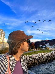 "ARGH-ARGH/SEAL" embroidered Cap design by Natali Koromoto. Made by Ho Hos Hole in The Wall. Waxed 100% cotton. Made in NYC.