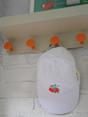 "You say Tomato, I say Tomate" hat design by Natali Koromoto.
