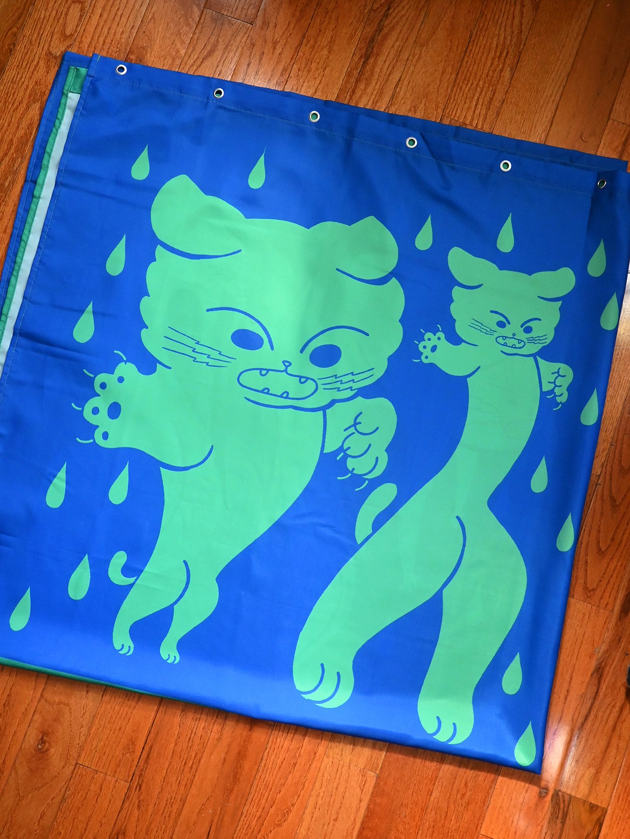 Part of the "Dry Cats" bath collection by illustrator Natali Koromoto. "Dry Cats" shower curtain.