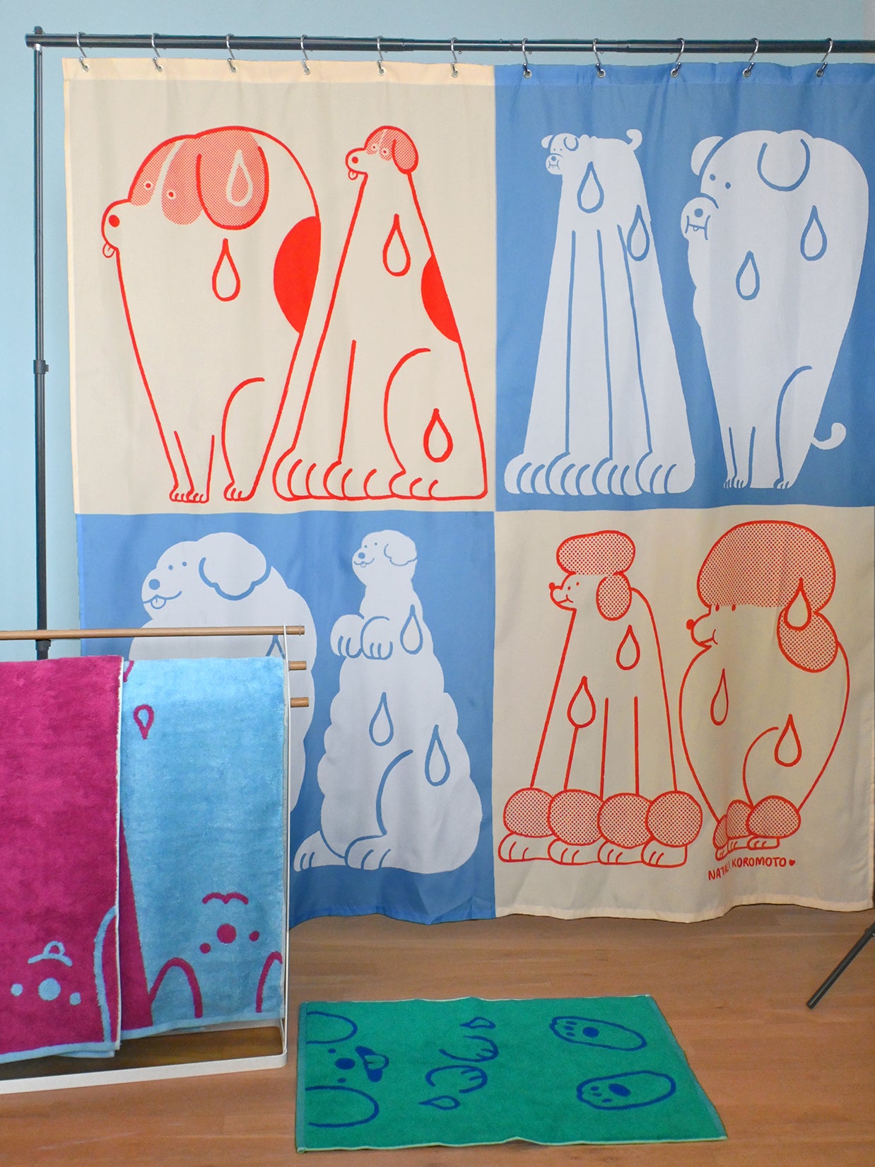 Part of the "Wet Dogs" bath collection by illustrator Natali Koromoto. "Wet Dogs" shower curtain.
