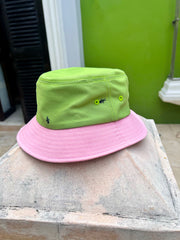 Natali Koromoto x HO HOS HOLE IN THE WALL brand "Ants on Your Hat" printed bucket hat in Avocado Green and True Pink dye colorway combo