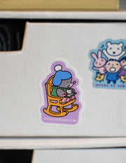 Pack of 10 vinyl stickers, Sticky Friends Edition #4. Designs by Natali Koromoto.
Includes one 4" x 6" postcard.