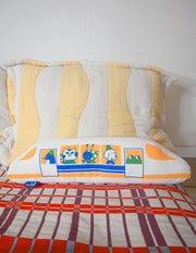 "The Passengers" throw pillow by Natali Koromoto. Showing full side view with animal characters enjoying their adventure on the Shinkansen bullet train.