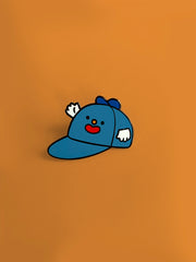 Home to the original hat wearing a hat, "Hat on Hat," designed by artist Natali Koromoto Martinez. This is an enamel pin of the original "Hat on Hat" illustration.