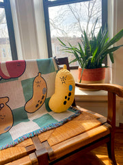 "Bad-nana" throw pillow. Design by Natali Koromoto Martinez.