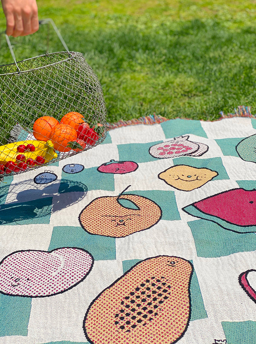 "The Picnic" woven cotton throw blanket. Designed in NYC by Natali Koromoto Martinez. Ethically made in the USA. OEKO-TEX Standard 100 certified.