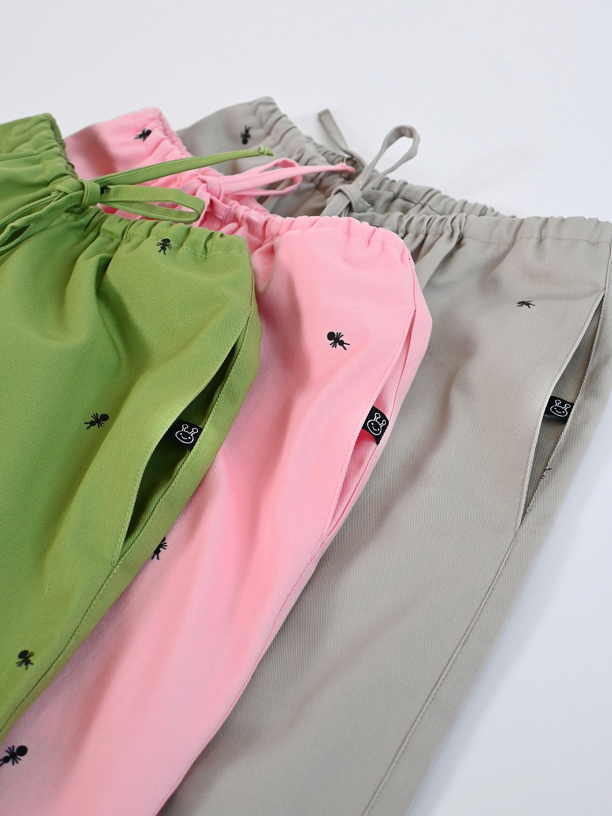 Natali Koromoto x HO HOS HOLE IN THE WALL brands "Ants on Your Pants"  print design lounge pull-on pants in Avocado green dye colorway. 100% organic cotton twill.