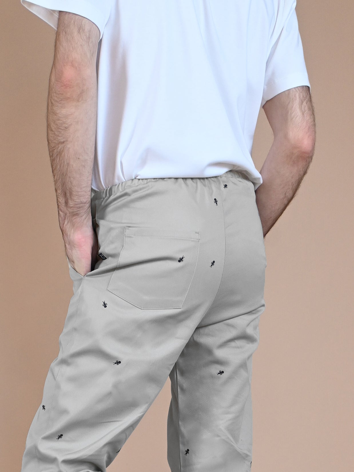Natali Koromoto x Ho Hos Hole in The Wall brand "Ants on Your Pants" custom print design in Pearl Grey dye colorway 🦪🐜 Unisex regular fit lounge pull-on pant with elastic waist. USA-milled 100% organic cotton, dyed and printed with non-toxic, low-impact dyes and inks. Machine wash OK. Sizes 2XS-3XL. Made in NYC.