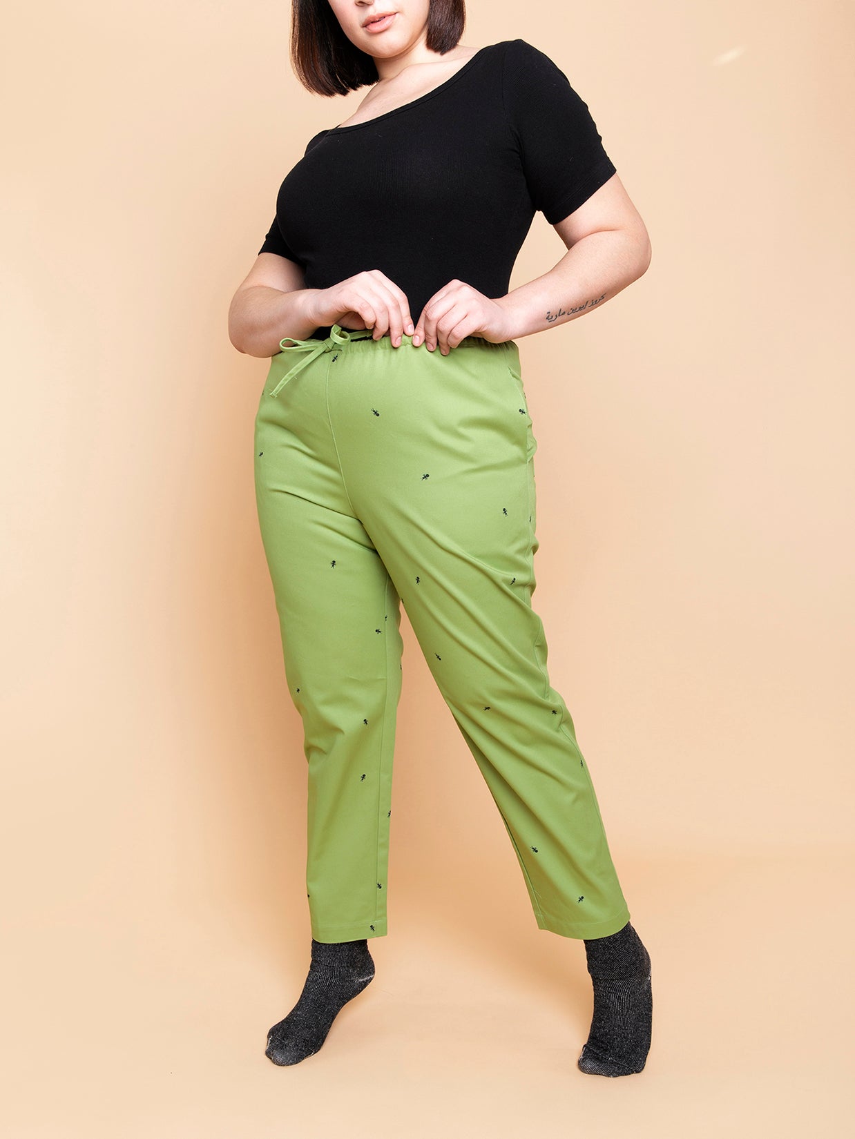 Natali Koromoto x HO HOS HOLE IN THE WALL brands "Ants on Your Pants"  print design lounge pull-on pants in Avocado green dye colorway. 100% organic cotton twill.