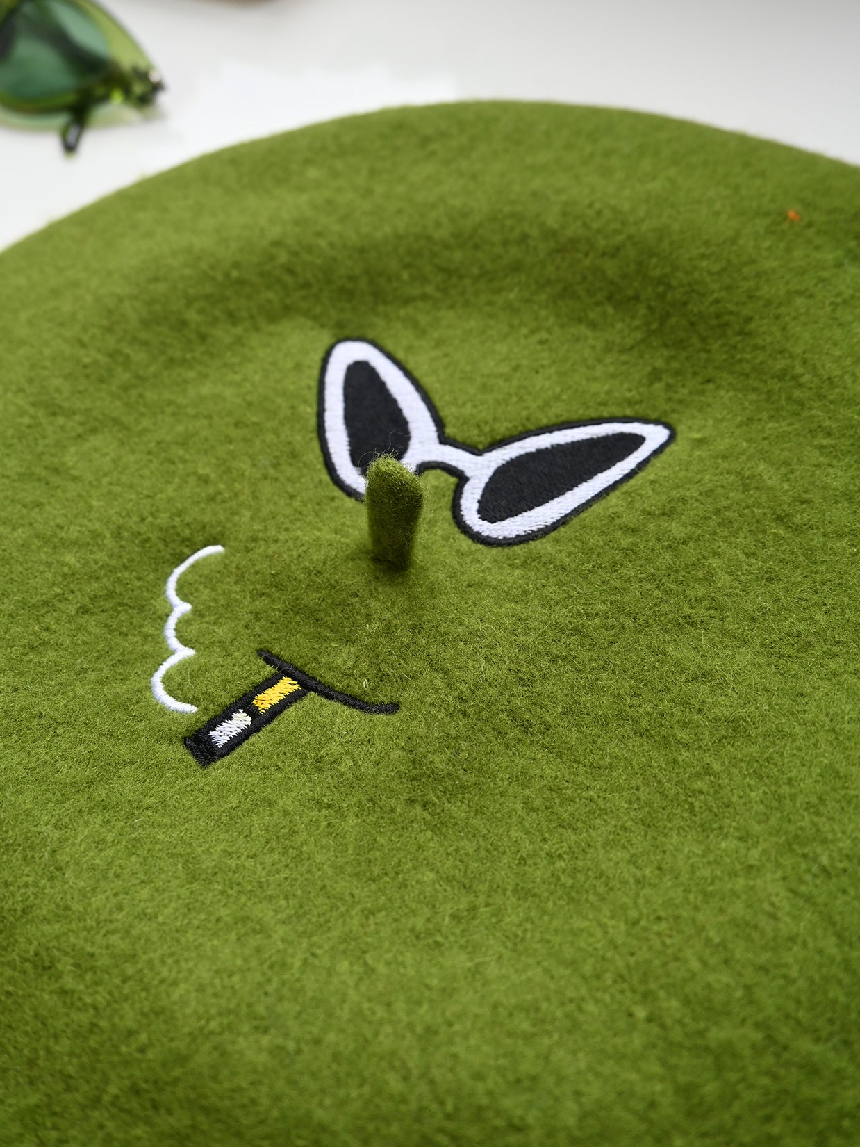 "Smoking is Bad" embroidered design by Natali Koromoto