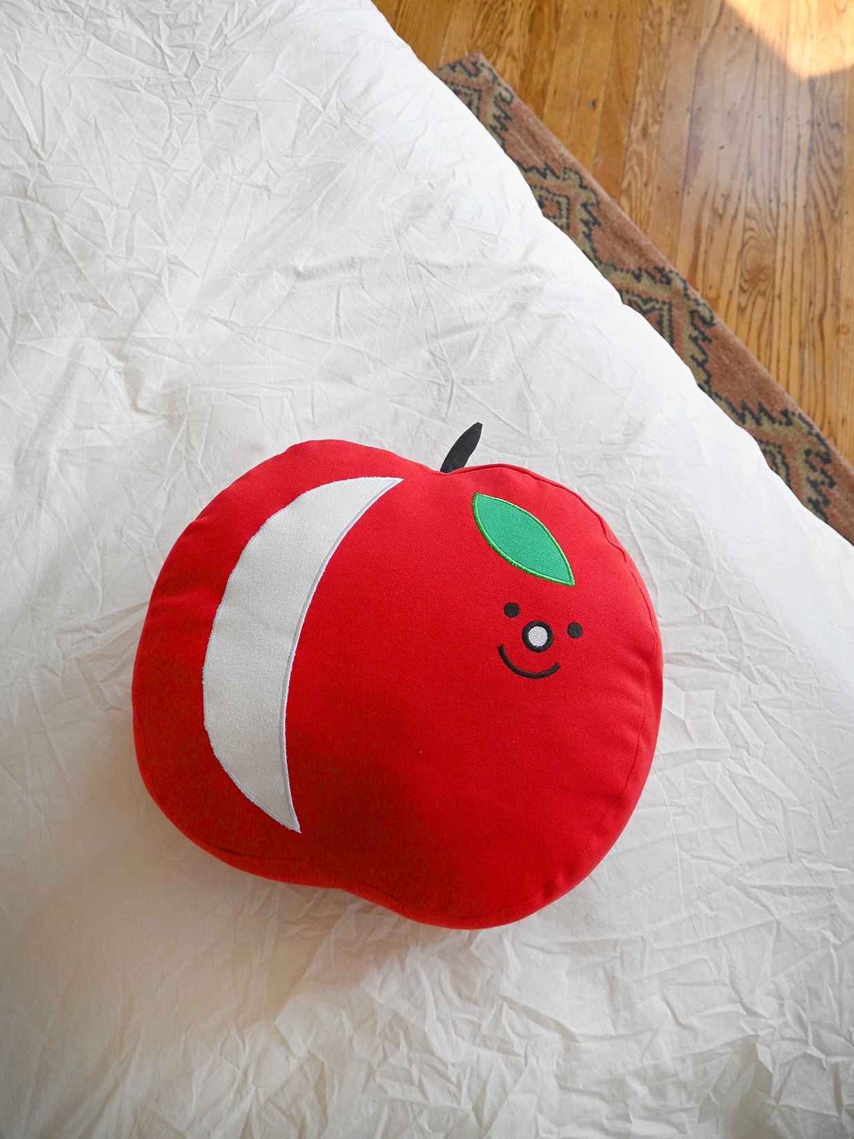 "Big Apple" throw pillow. Design by Natali Koromoto.