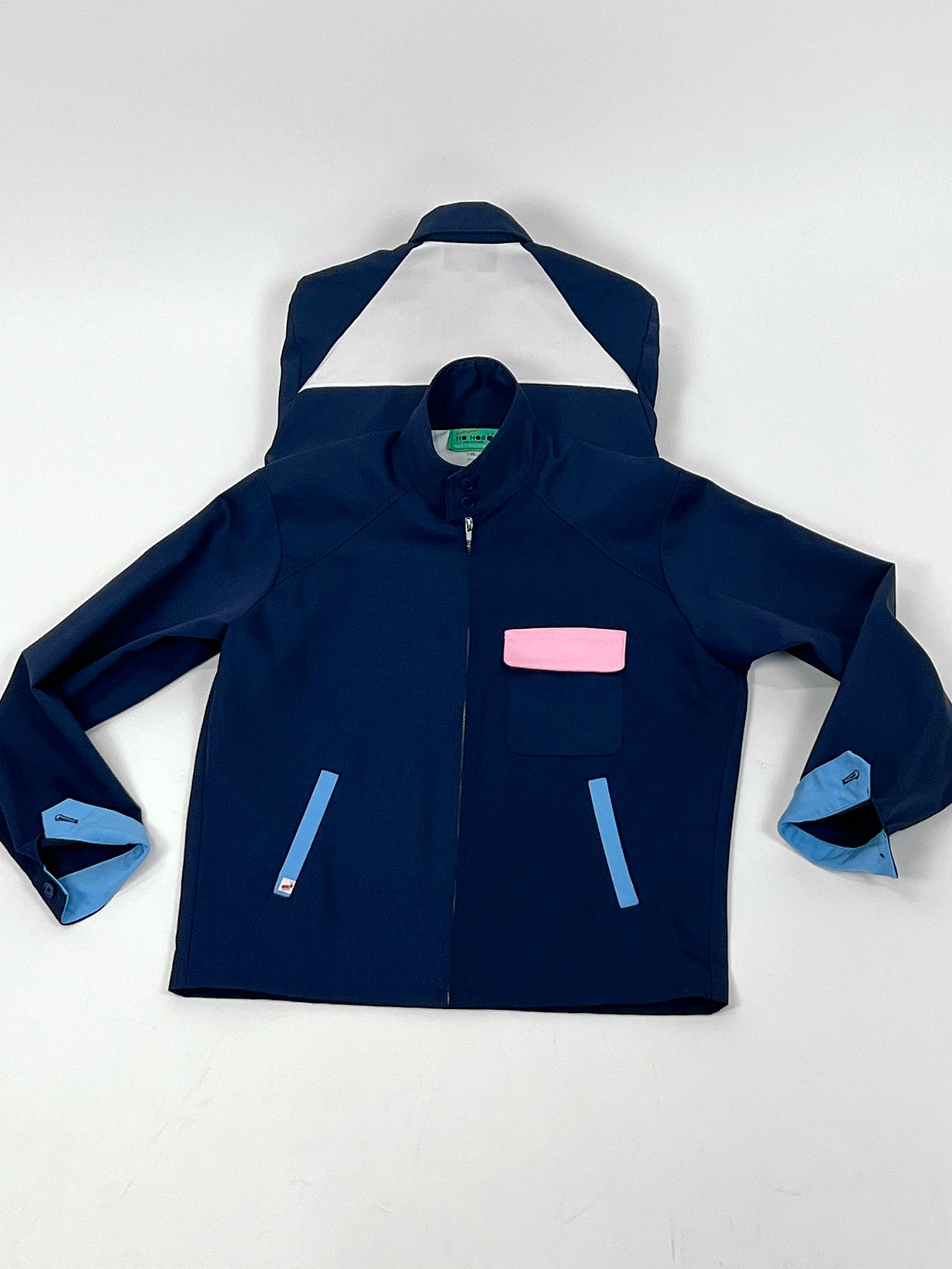 "In the navy" color block Jacket design by Natali Koromoto's in-house clothing brand Ho Hos Hole in The Wall. Made in NYC with Eco-Twill, a combo organic cotton and polyester spun from recycled water and soda bottles.
