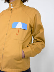 "Umbrella" Jacket - Honey dye colorway. Designed by Natali Koromoto's in-house clothing brand Ho Hos Hole in The Wall. Made in NYC with Eco-Twill, a combo organic cotton and polyester spun from recycled water and soda bottles.