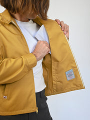 "Umbrella" Jacket - Honey dye colorway. Designed by Natali Koromoto's in-house clothing brand Ho Hos Hole in The Wall. Made in NYC with Eco-Twill, a combo organic cotton and polyester spun from recycled water and soda bottles.