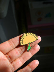 "Food on Parade" (Empanada) Enamel Pin. Design by Natali Koromoto Martinez (NYC)