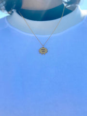 "Sunny-Side-Up" Vermeil pendant. Design by Natali Koromoto.