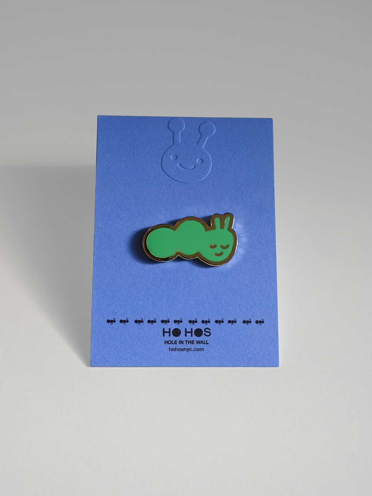 "Caterpillar" Enamel pin. Designed by HO HOS HOLE IN THE WALL (NYC)