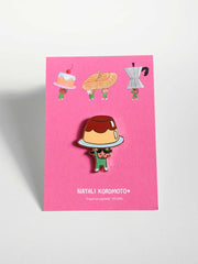 "Food on Parade" (Flan) Enamel Pin. Design by Natali Koromoto Martinez (NYC)