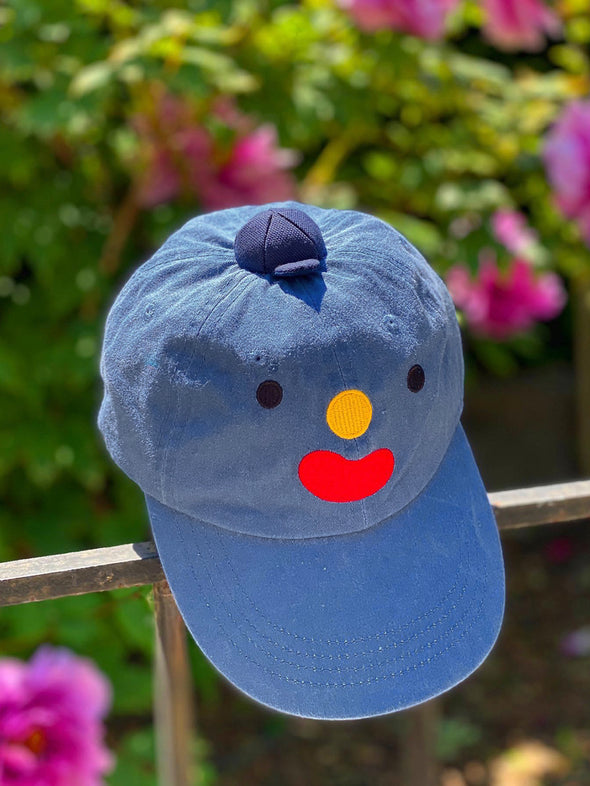 The original "Hat on Hat", designed by illustrator Natali Koromoto.