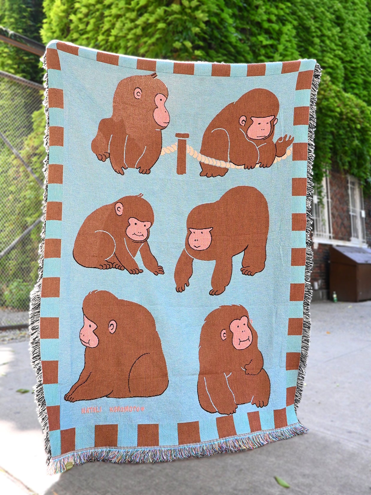 "Macaques!" Throw blanket. Design by Natali Koromoto NYC