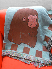 "Macaques!" Throw blanket. Design by Natali Koromoto NYC