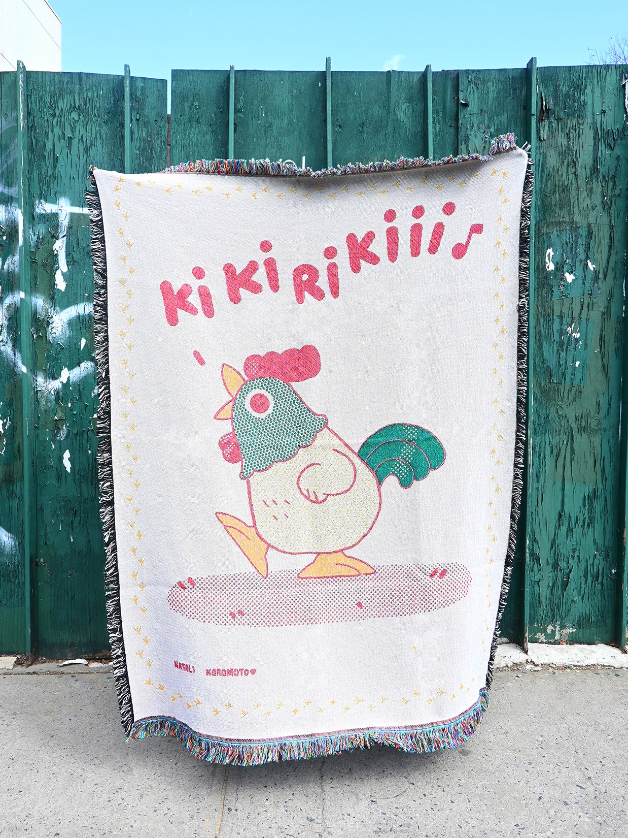 "Kikiriki!" Throw blanket. Design by Natali Koromoto Martinez. Made in the U.S.