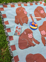 "Macaques!" Throw blanket. Design by Natali Koromoto NYC