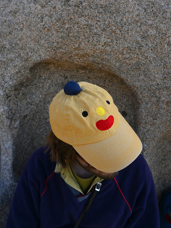 The original "Hat on Hat", designed by illustrator Natali Koromoto.