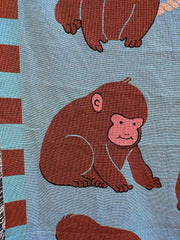 "Macaques!" Throw blanket. Design by Natali Koromoto NYC