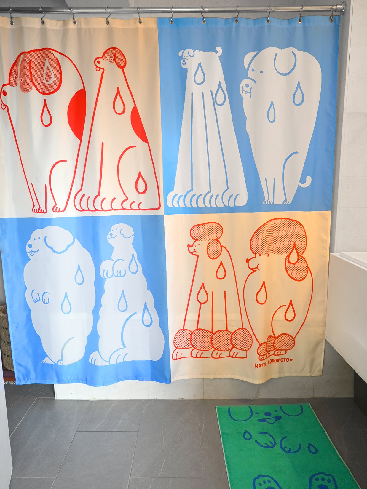 Part of the "Wet Dogs" bath collection by illustrator Natali Koromoto. "Wet Dogs" shower curtain.