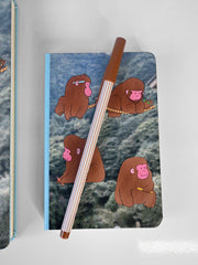 "Macaques!" Hardcover Notebook. Designed by Natali Koromoto Martinez.