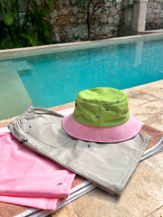 Natali Koromoto x HO HOS HOLE IN THE WALL brand "Ants on Your Hat" printed bucket hat in Avocado Green and True Pink dye colorway combo