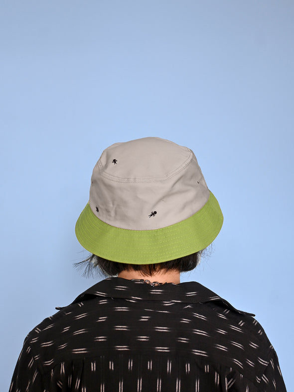 Natali Koromoto x HO HOS HOLE IN THE WALL brands "Ants on Your Hat"  print design bucket hat in Pearl Grey and Avocado Green dye colorway organic cotton fabric combo