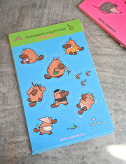 "Pleasantly Platypus" sticker sheet pack featuring 9 stickers. Designed by illustrator Natalí Koromoto Martínez.