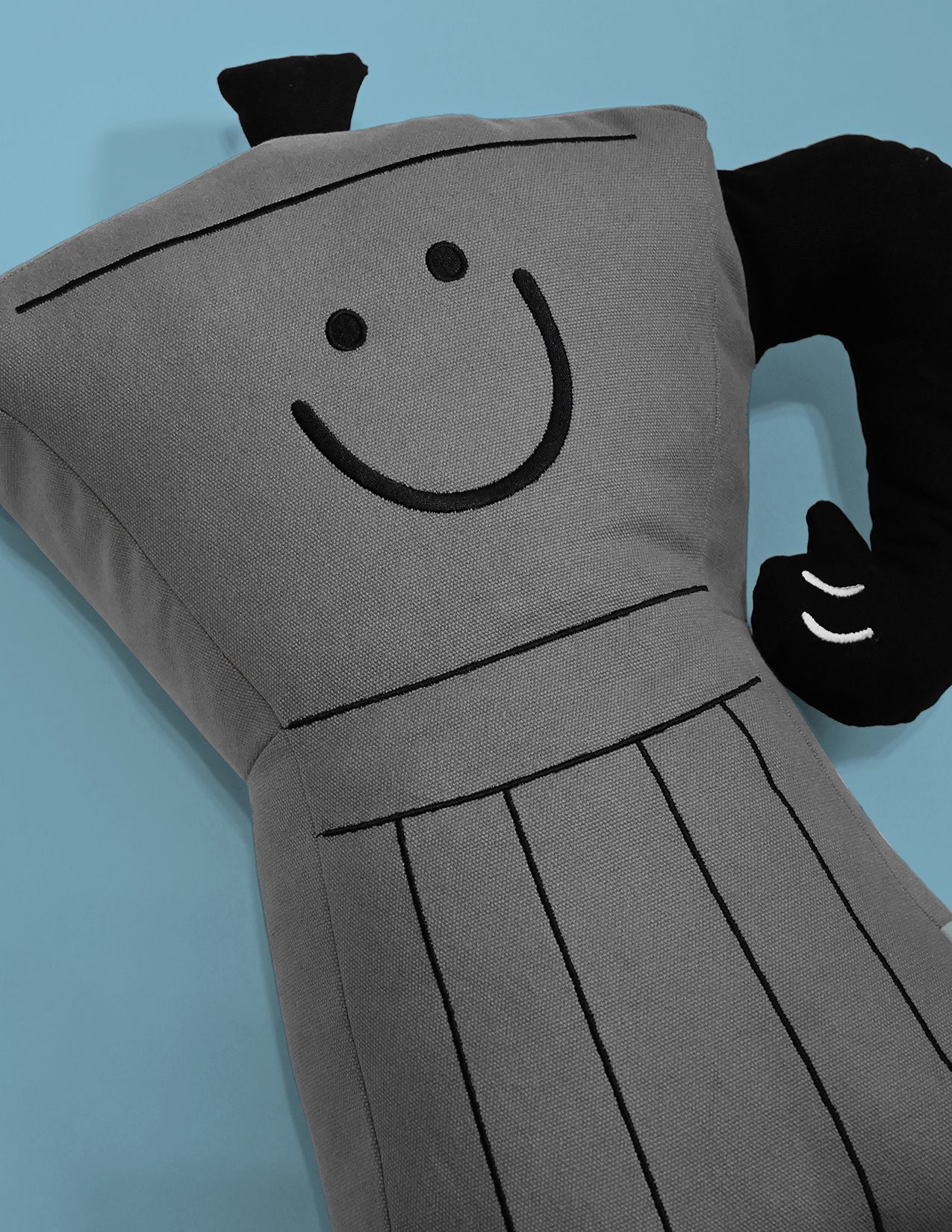 Throw pillow: Smiling espresso percolator character with thumbs up handle for an arm. Design by illustrator Natali Koromoto.