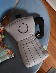 Throw pillow: Smiling espresso percolator character with thumbs up handle for an arm. Design by illustrator Natali Koromoto.