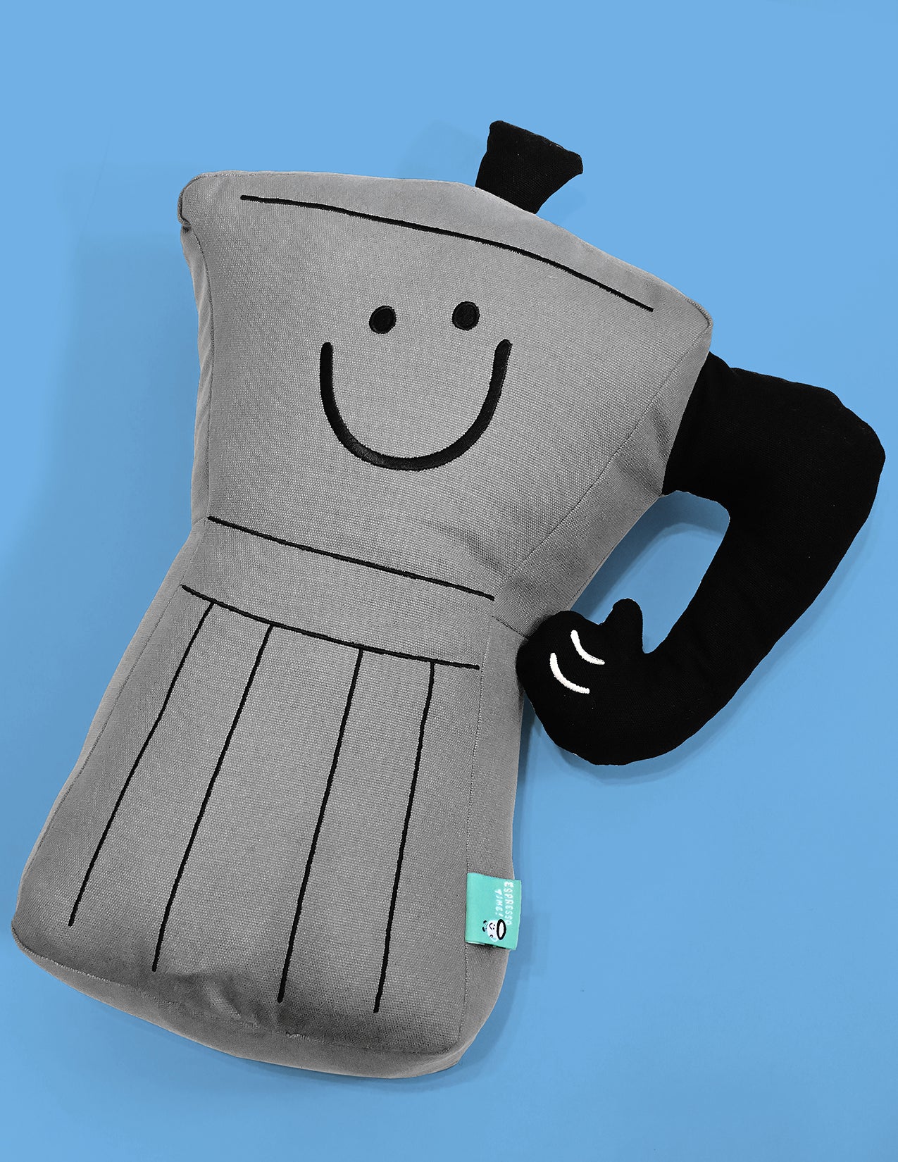 Throw pillow: Smiling espresso percolator character with thumbs up handle for an arm. Design by illustrator Natali Koromoto.
