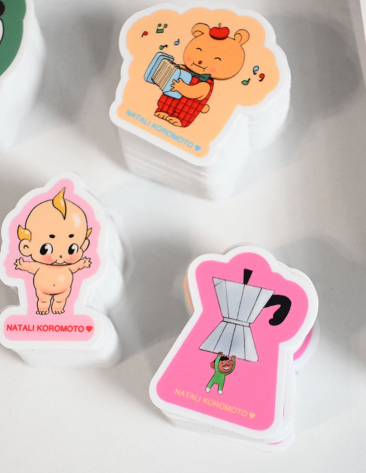 Pack of 10 vinyl stickers, Sticky Friends Edition #4. Designs by Natali Koromoto.
Includes one 4" x 6" postcard. 